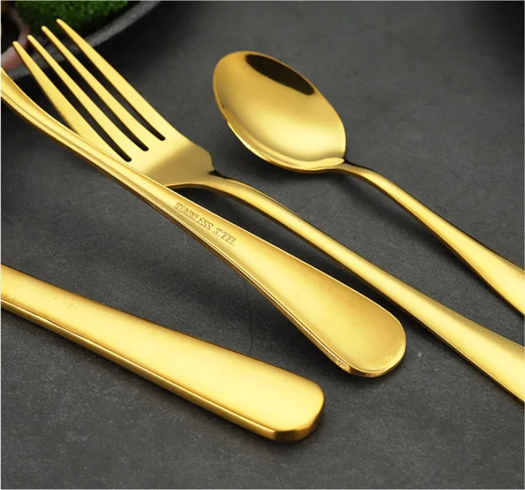 24-piece stainless steel tableware set showing knives, forks and spoons in multiple colour options