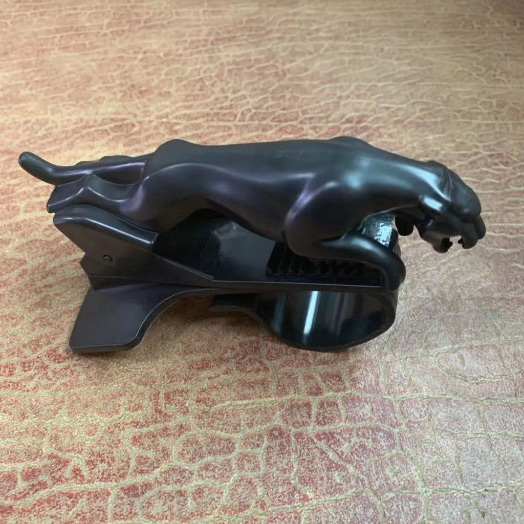 Rotatable car phone holder bracket in black mounted on windscreen