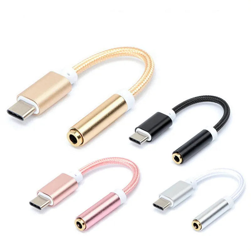 Type-C to 3.5mm female headphone adapter cable in black, silver, gold, and rose gold colours.