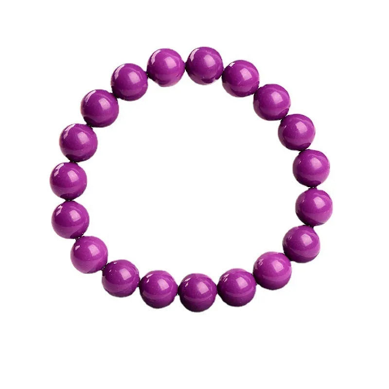 Purple mica crystal bracelet on wrist showing polished finish and single circle design.