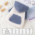A blue hooded dog coat with thick cotton padding, shown on a model.
