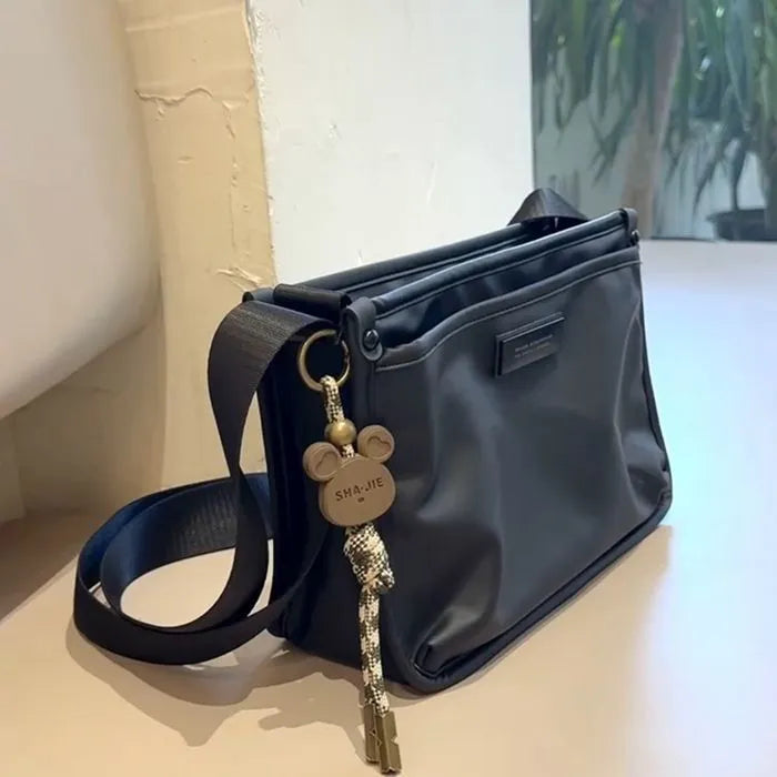 Oxford cloth crossbody bag in cool colour with street trend style and square shape