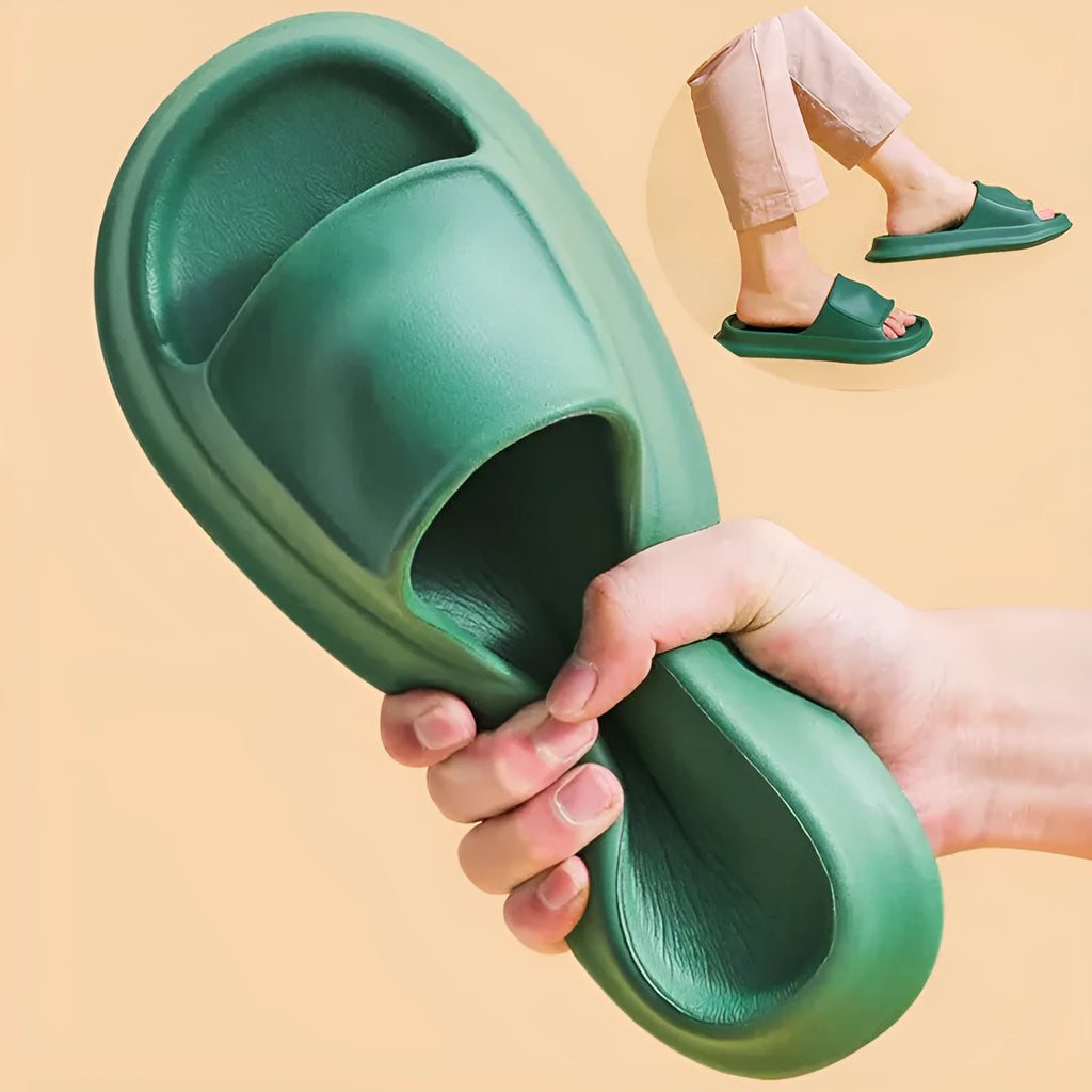 A pair of soft, thick-soled EVA flip-flop slippers in a chosen colour, showing the non-slip tread pattern on the sole.