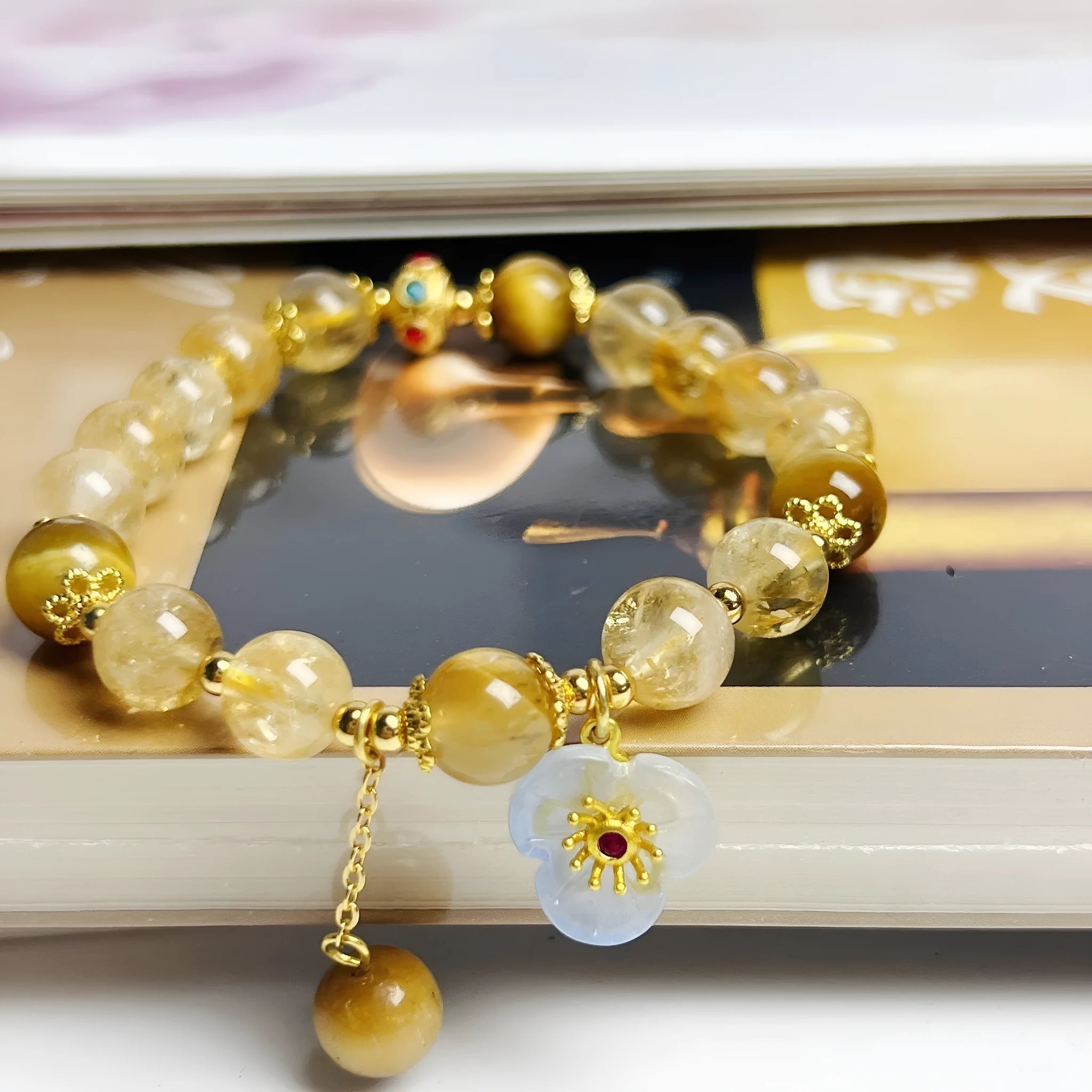 Yellow citrine crystal bracelet with flower tassel decoration for women