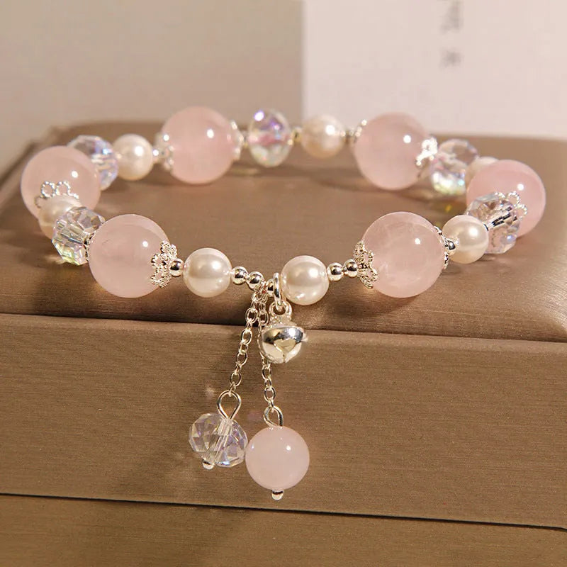 Natural pink crystal bracelet for women with pearl and bell accent, Japanese Korean style