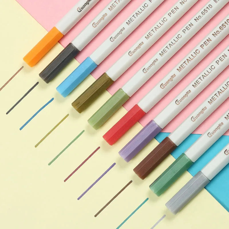 Black card album containing a set of colour metal pens with plastic shells for office stationery.