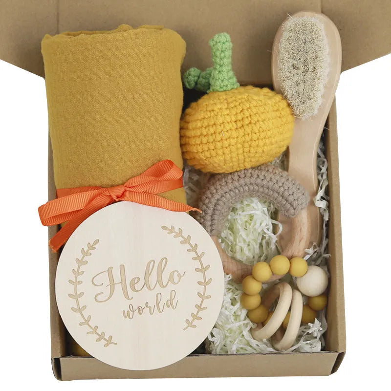 Baby teething gift set with wooden toys and large bamboo-cotton gauze blanket in assorted colours