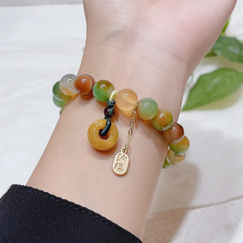 Women's yellow peacock agate and topaz bracelet with peace buckle fastening, 1cm wide national style design