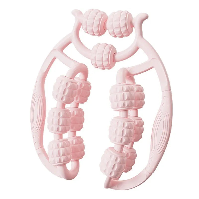 A handheld ring clip leg massage roller with double-row wheels, shown in coral pink.