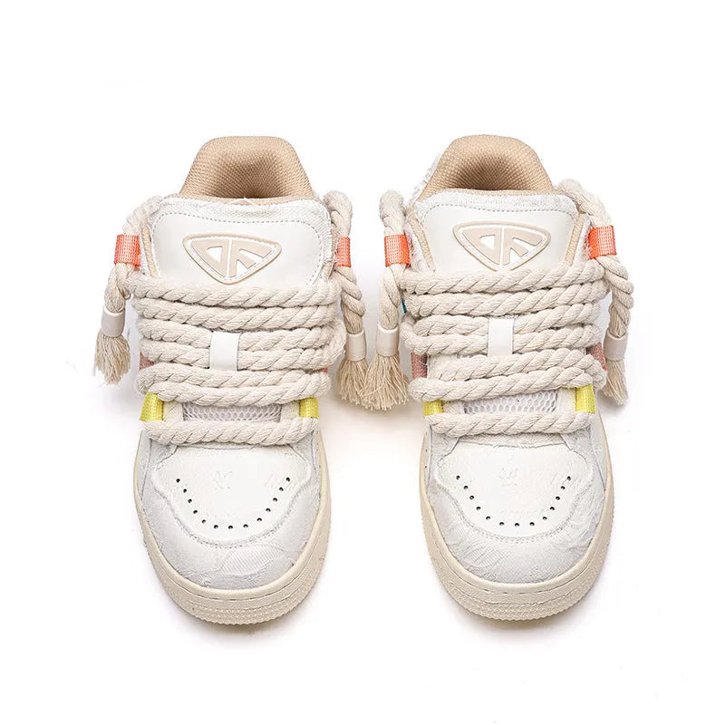 Creamy white retro skateboard shoes with old damage lace design and low-top platform profile