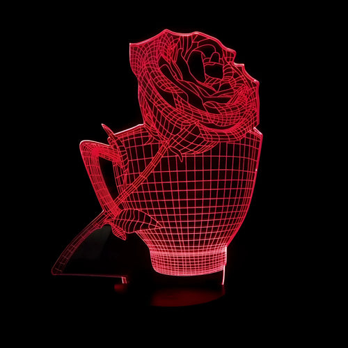 3D Rose Flower Night Light in black finish showing laser-engraved design glowing in purple light, with remote control.
