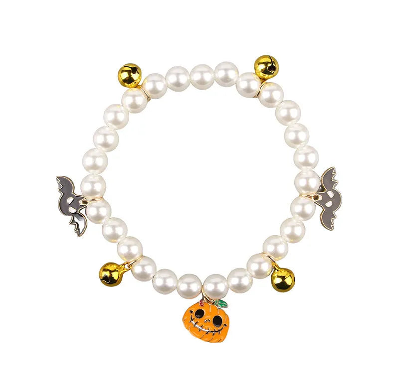 Halloween cat collar with simulated pearl beads and purple pumpkin charm decoration