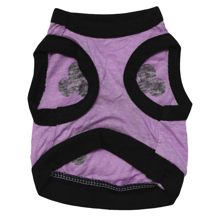 Blue Halloween dog vest with skull bones pattern on a small dog, showing stretch cotton tank top design