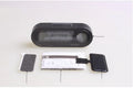 Black digital car dashboard clock and thermometer with LED display on an adjustable mounting bracket.