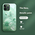 Red tempered glass painted phone case with blooming rose design on a white background