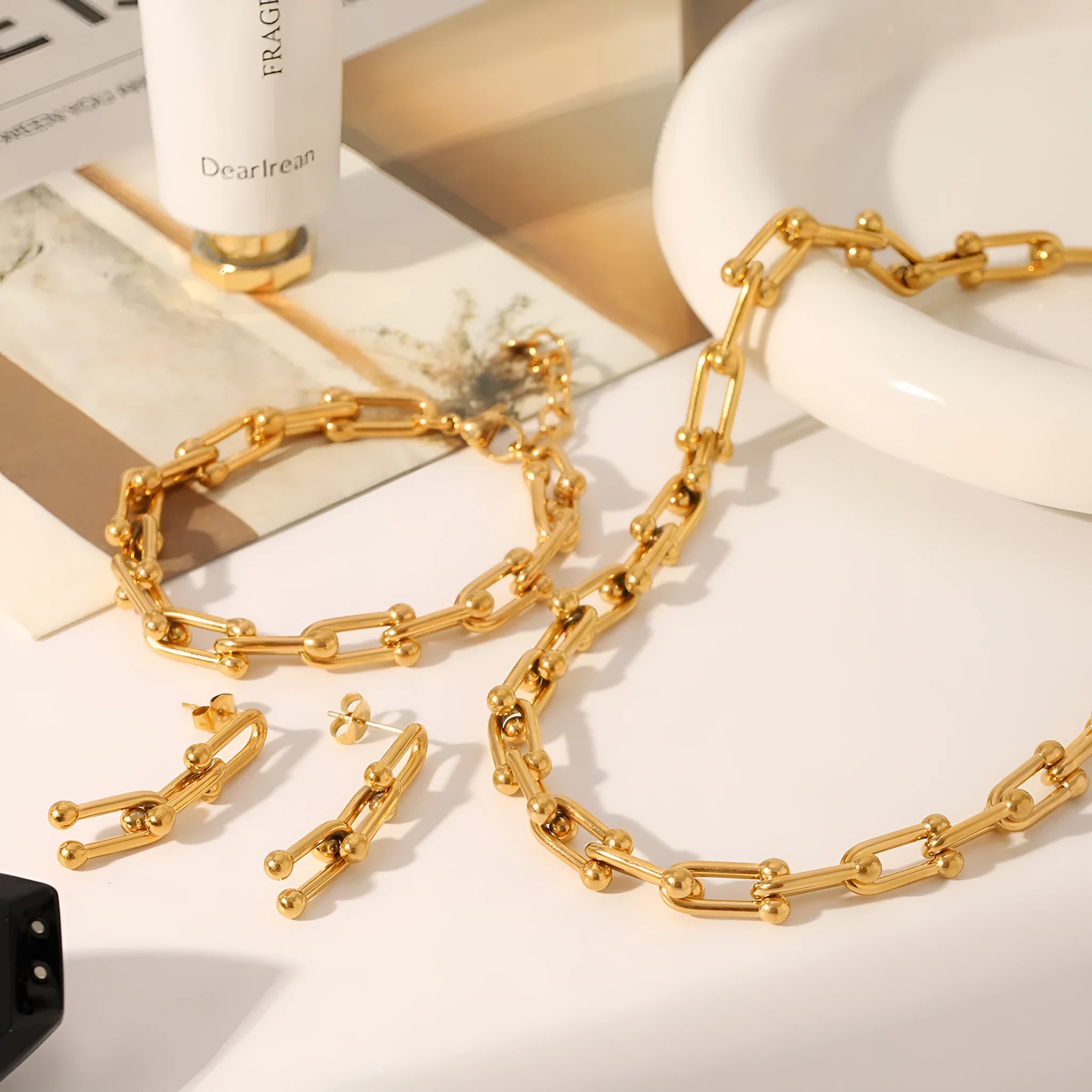 Stainless steel horseshoe chain jewellery set with titanium pendant in multiple colour options