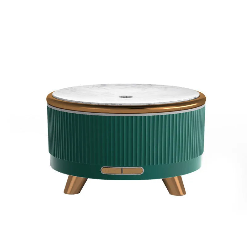 Cylinder plastic USB humidifier in black with 500ml tank and single fog outlet on a bedside table