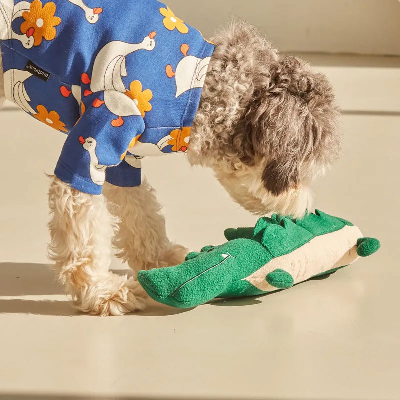 Green plush interactive toy dog measuring 35cm in length for pet play