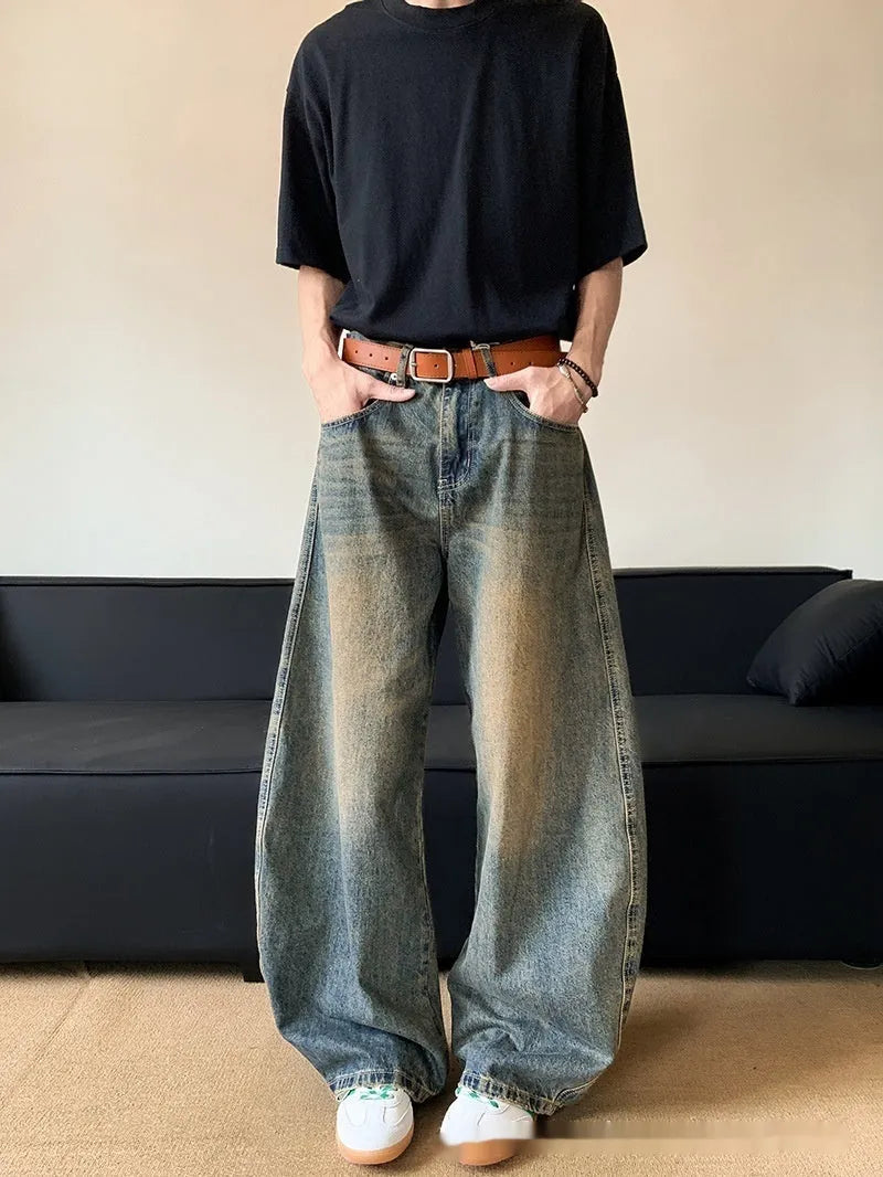 Men's retro blue jeans with distressed machete detailing and slimming wide-leg cut on mid waist design