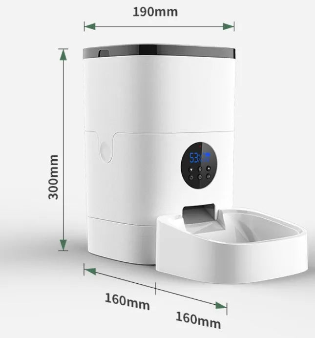 White smart pet automatic feeder with 6 litre capacity, stainless steel tray, and digital timer on a kitchen counter