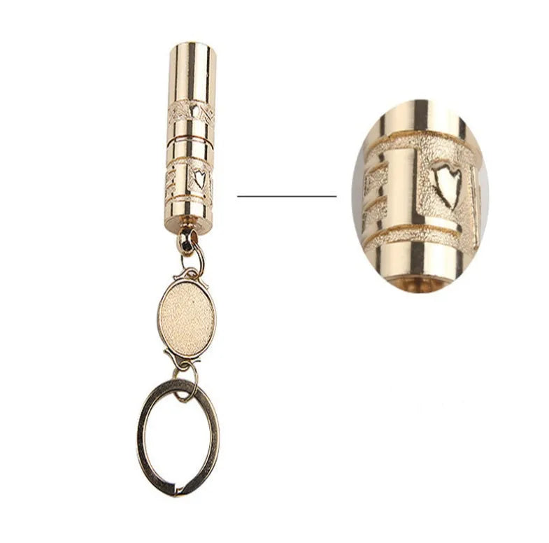 Gold-coloured zinc alloy mini portable LED flashlight on a keyring.