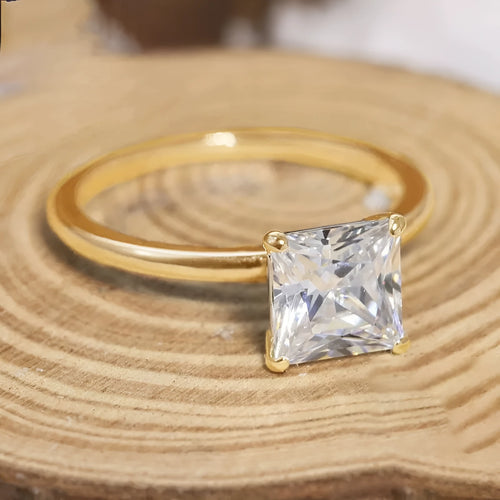 A geometric 925 sterling silver ring with a round zirconium detail, shown in silver, gold, and rose gold colour options.