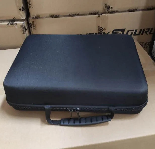Black and white portable massage gun for deep tissue muscle relaxation