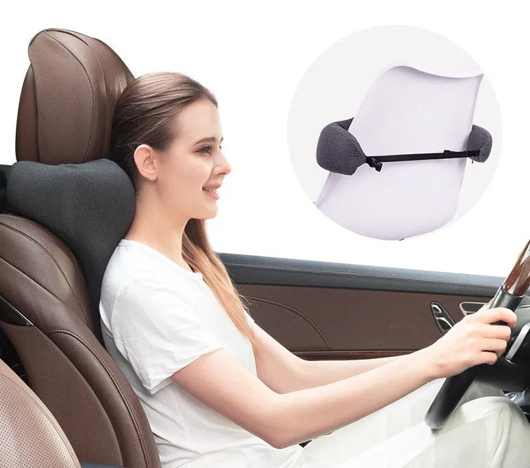 Memory foam car neck pillow in dark grey colour showing U-shaped design for automotive headrest support