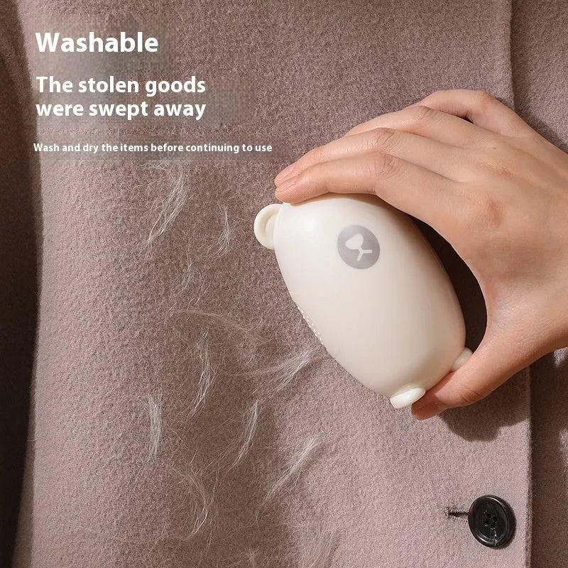 Washable reusable lint remover roller in green colour with ABS plastic body and silicone adhesive roller.
