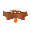 Brown leather cat collar with a metal bell on an adjustable strap.