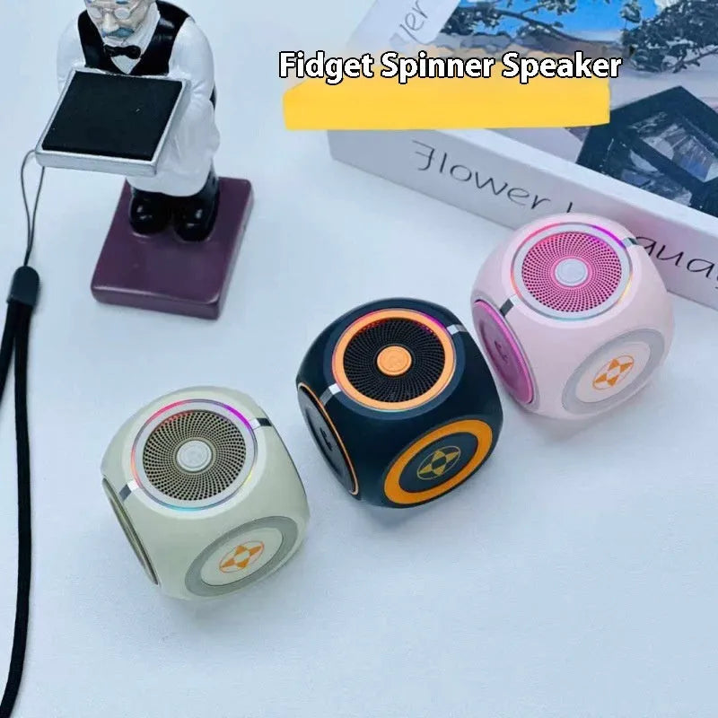 Decompression rotating gyro bass Bluetooth speaker in black with LED light on outdoor surface
