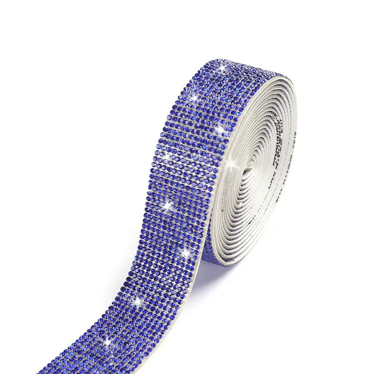 Self-adhesive water drill rhinestone strip in white and AB colour on a one-yard roll.