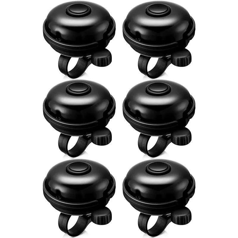 Black ABS plastic bicycle bell with 58mm diameter on a mountain bike handlebar fixture