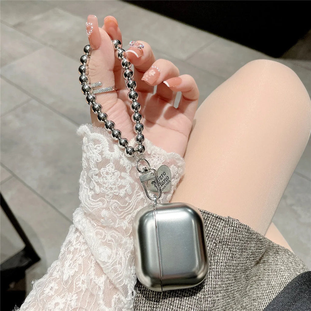Matte plating AirPods protective case with electroplated detailing and bracelet element