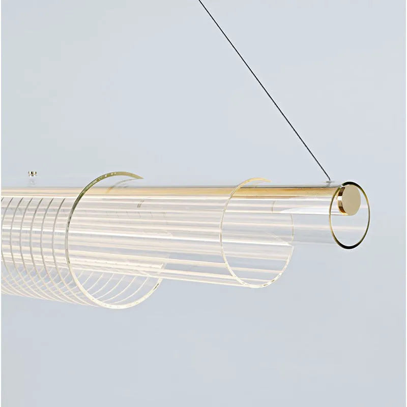Modern minimalist glass pendant lamp with iron suspension in three length options.