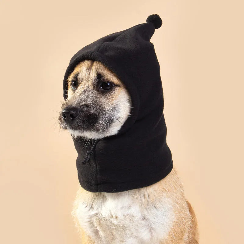 Cloth pet headgear with rabbit ears on a dog, in leopard print, with adjustable strap.