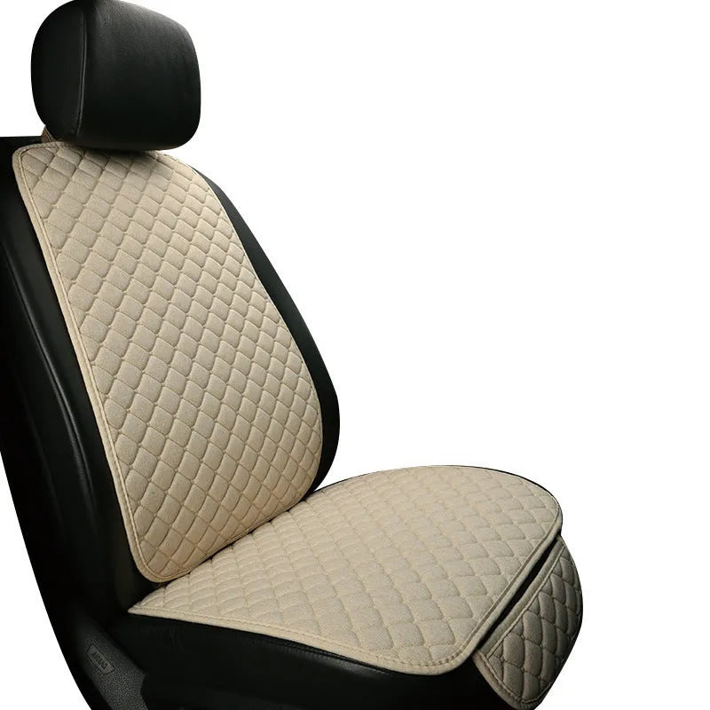 Linen car seat cushion showing colour options including warm cream, coffee and Lafite red variations