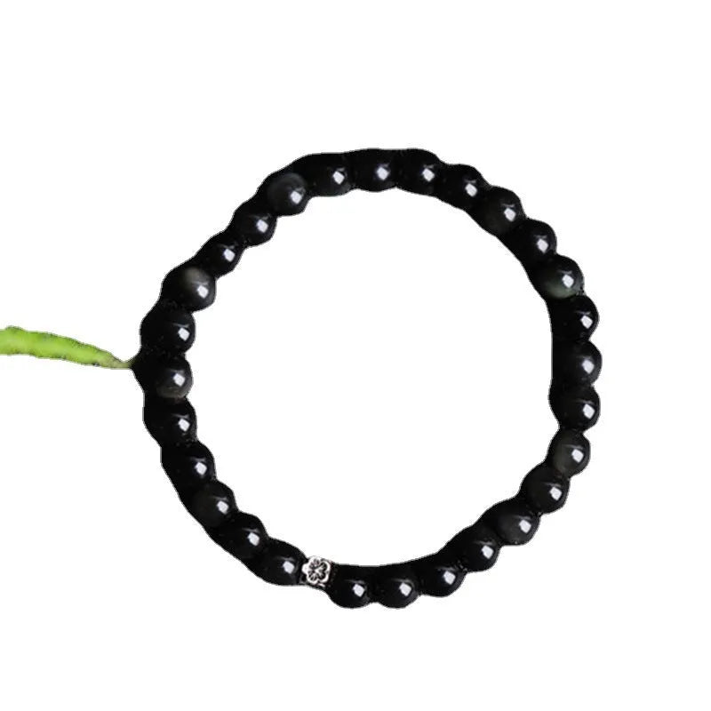 Natural obsidian bracelet with S925 silver flower charm and dragon phoenix constellation design