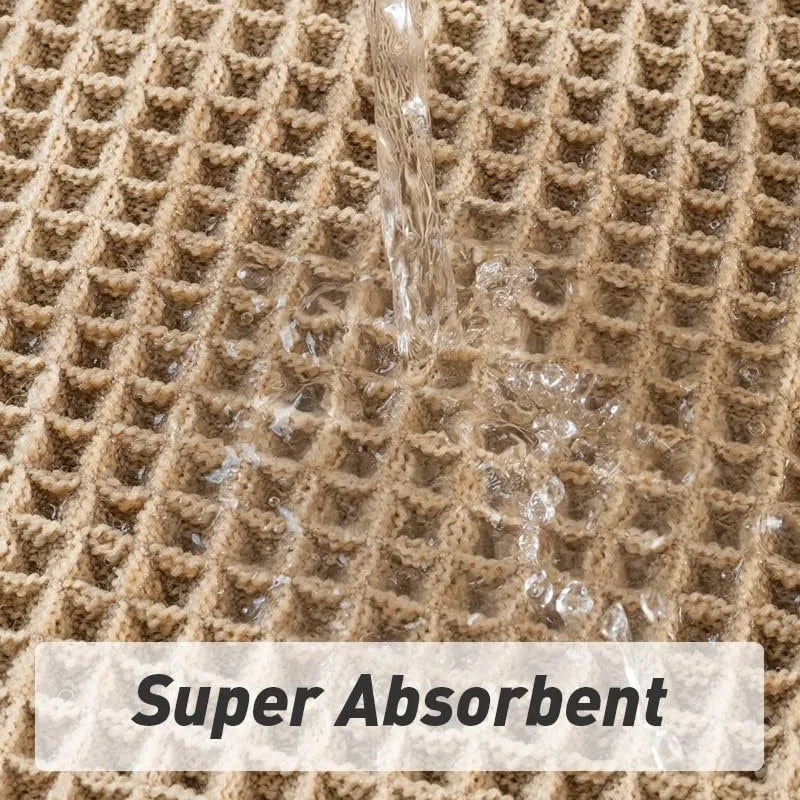 Checkered non-slip polyester bathroom floor carpet in a neutral colour on tiled floor.