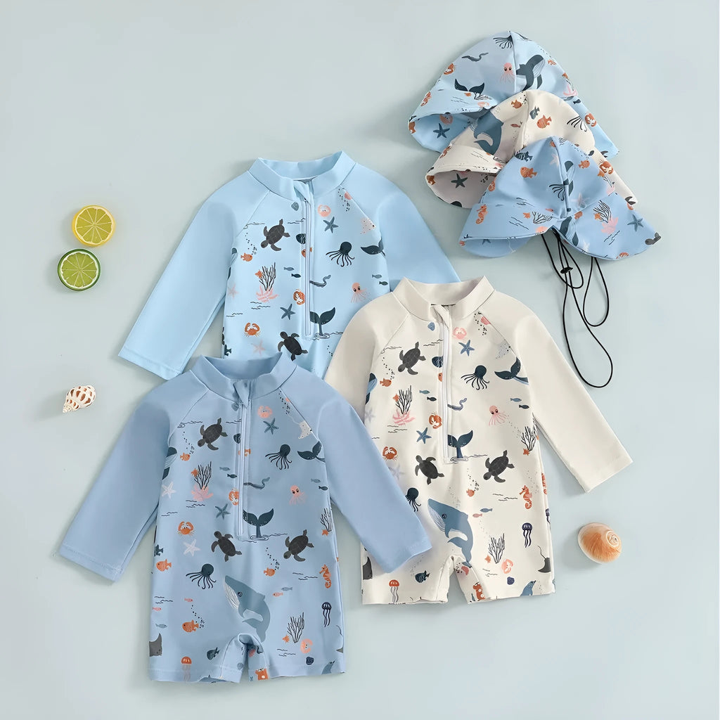 Boys one-piece long sleeves swimsuit in light blue with matching hat, cartoon pattern, sizes 70 to 120 cm