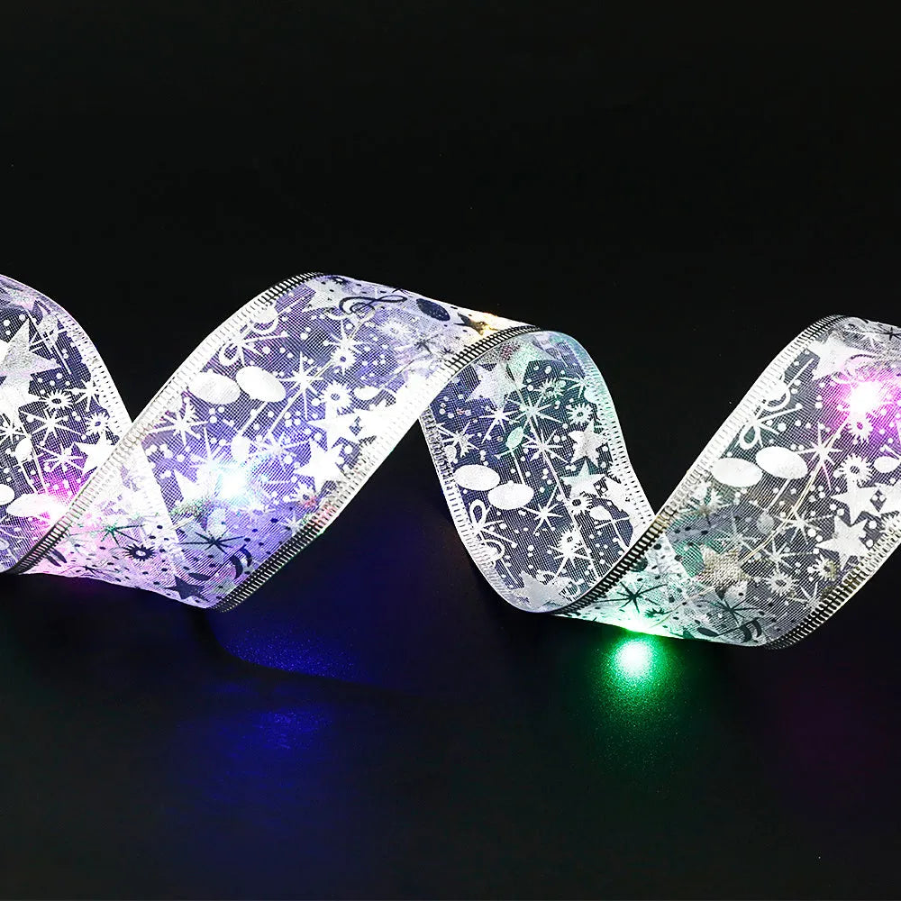 Cloth ribbon fairy lights with bow tie design and integrated LED lights for Christmas decoration