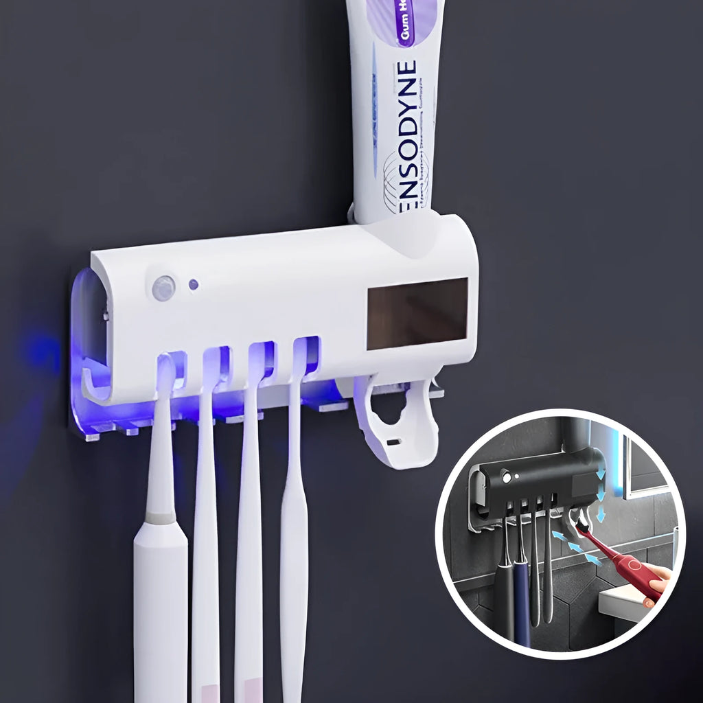 Black intelligent UV toothbrush steriliser with automatic toothpaste squeezer mounted on a bathroom wall.