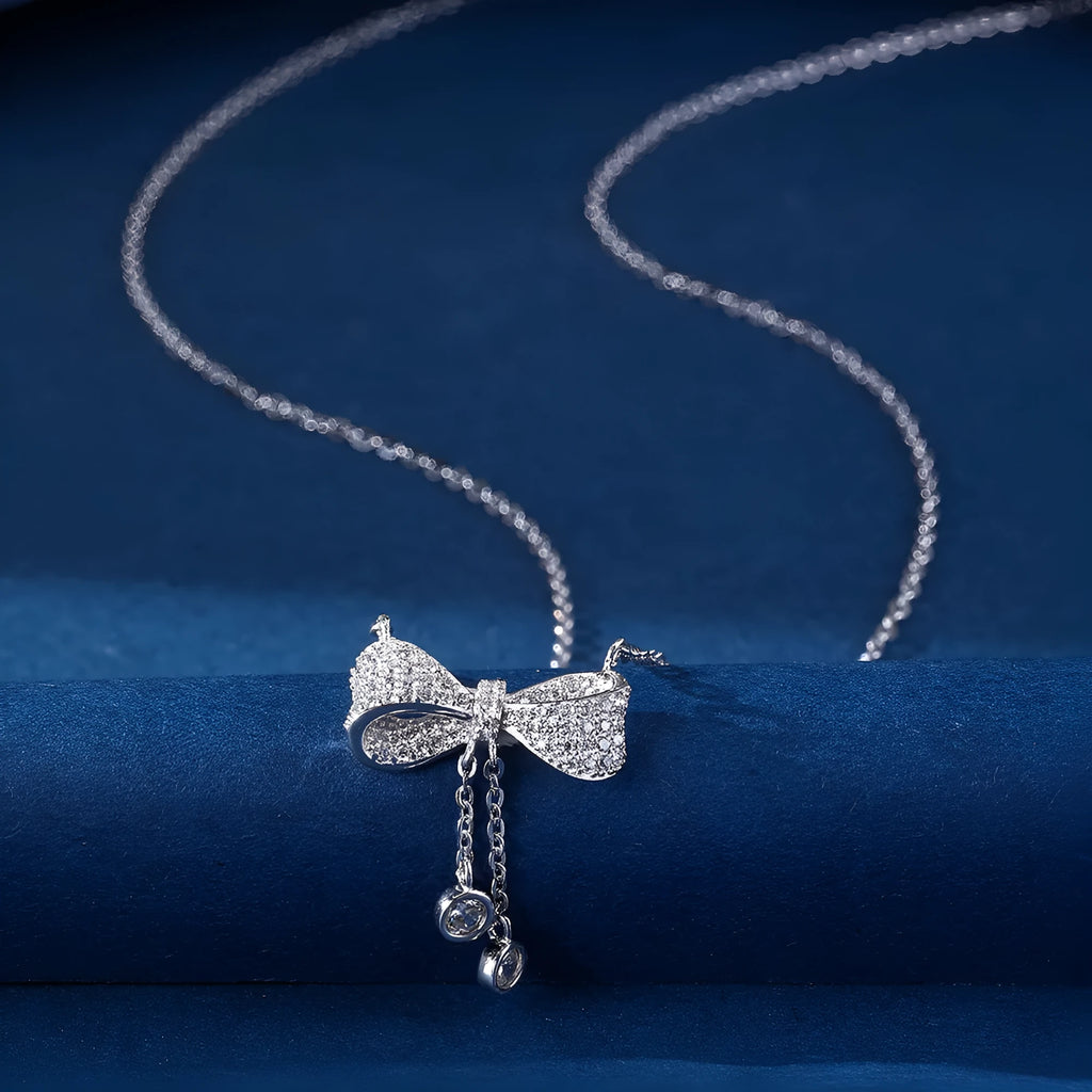 S925 sterling silver bow pendant necklace with adjustable O-ring chain for women