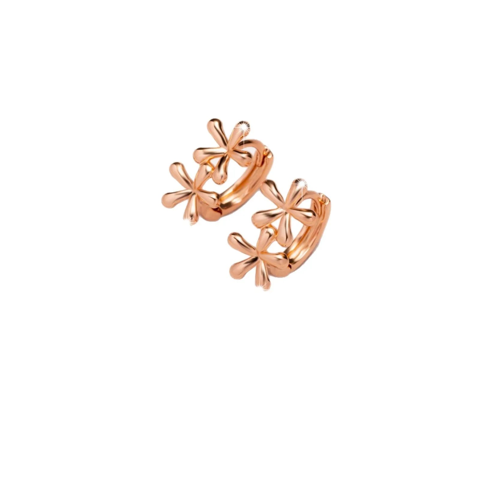 A pair of rose gold coloured waterdrop and circular shaped women's earrings on a white background.