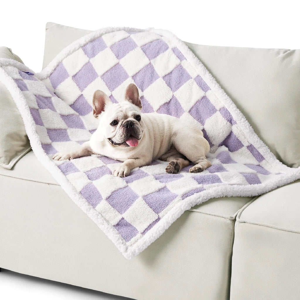 Waterproof dog blanket in blue sky white clouds pattern showing size options