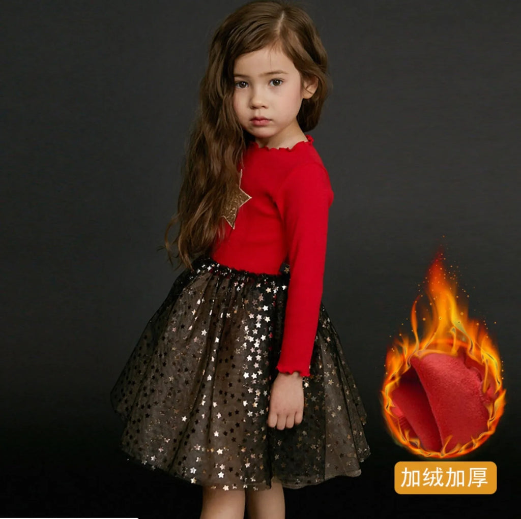 Girls red Christmas dress with long sleeves, princess skirt, and embroidered star details