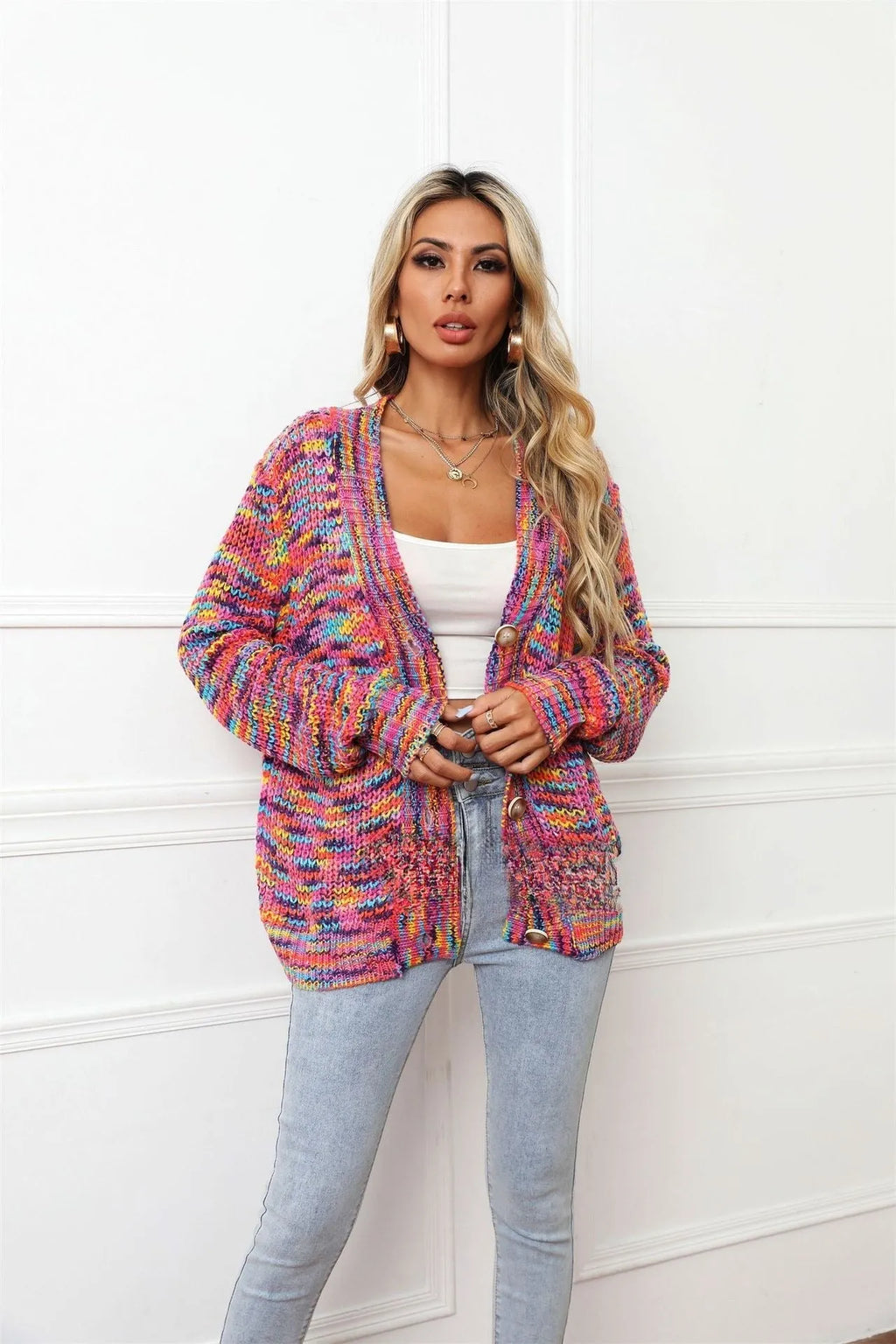 Rose red rainbow striped loose fit short cardigan knitted coat on a model.