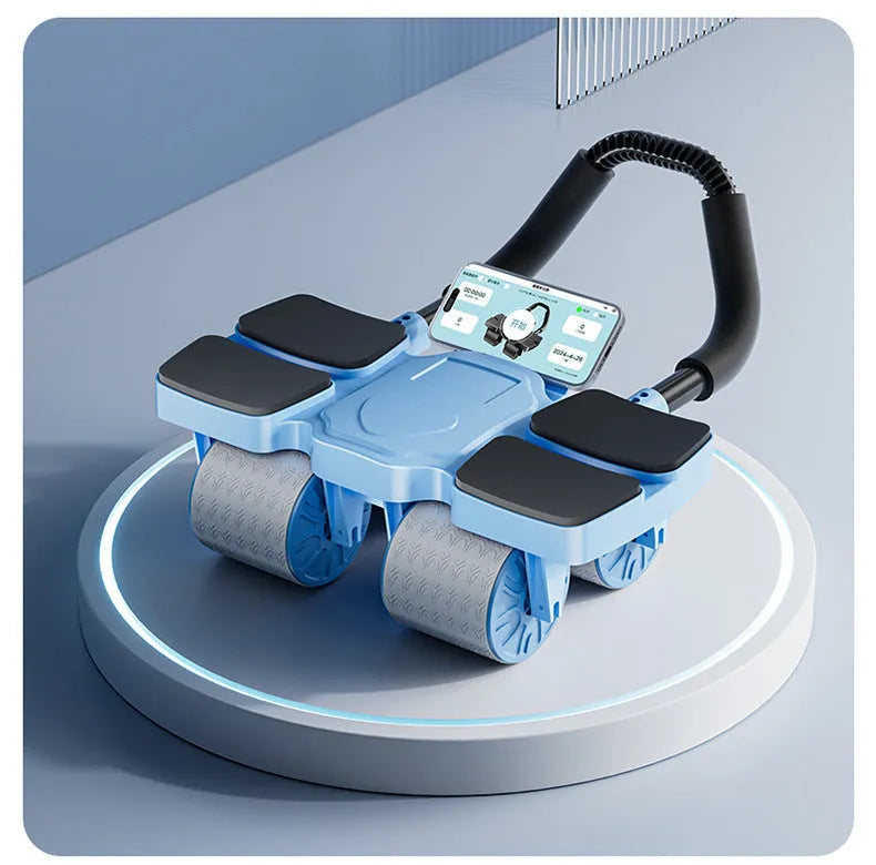 Black automatic rebound abdominal exercise wheel with four wheels on a floor.