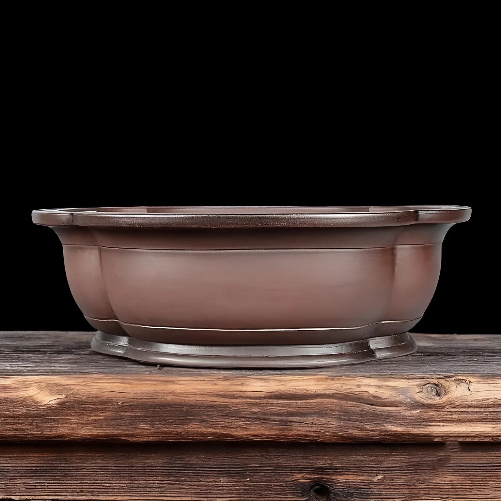 Handmade antique Chinese style purple clay flowerpot shaped like a crabapple fruit.