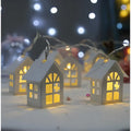 10 LED house-shaped warm white fairy light string on a 2-metre wire with battery and USB power options for Christmas or party decoration